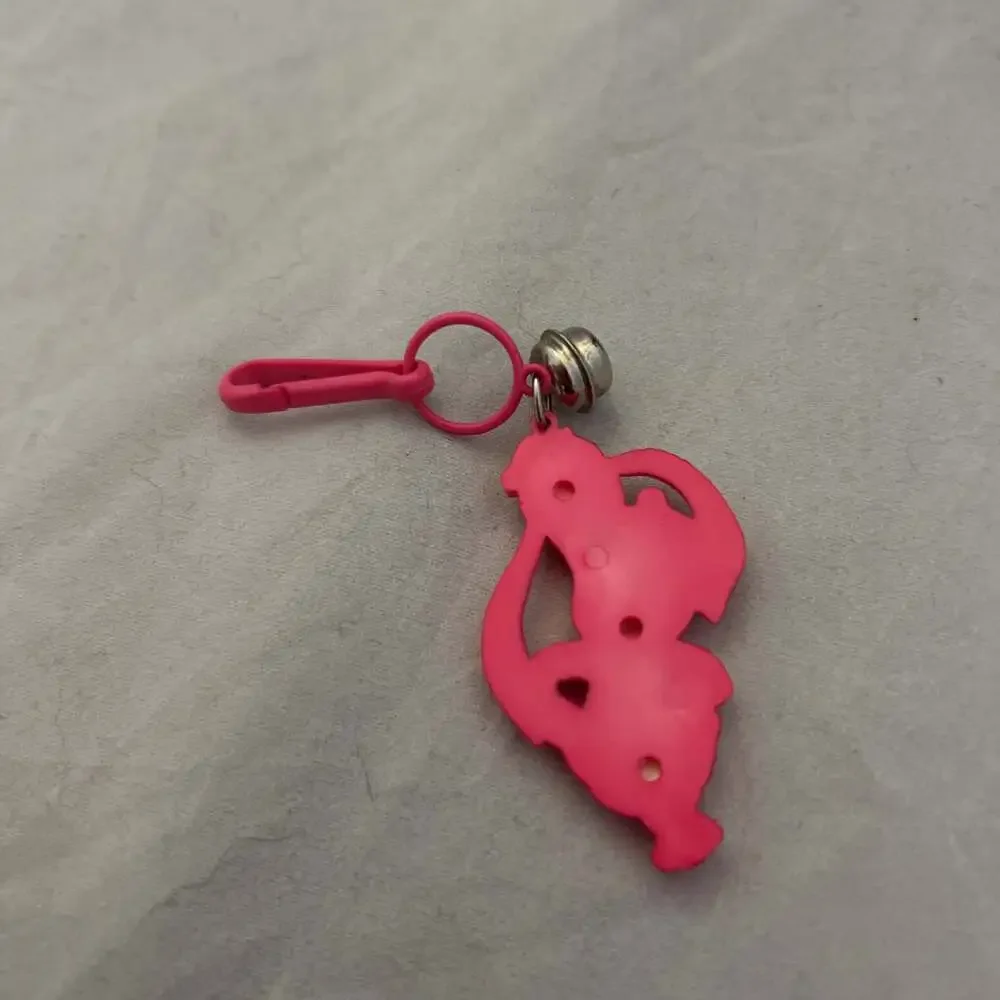 Vintage 1980 neon pink dog bell charm